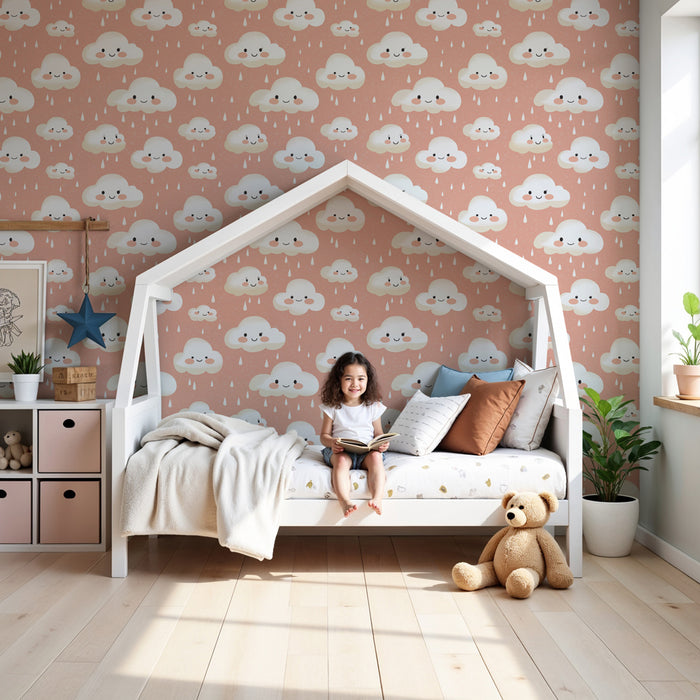 Papier peint chambre enfant à motifs | Nuages souriants sur fond rose