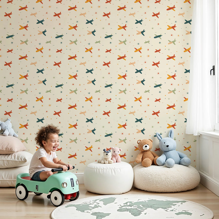 Papier peint chambre enfant à motifs | Avions colorés sur fond crémeux