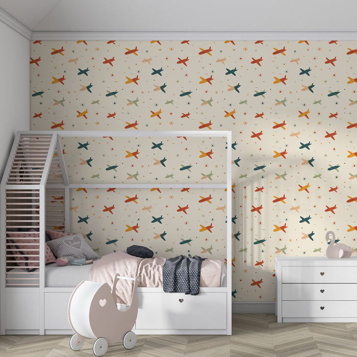 Papier peint chambre enfant à motifs | Avions colorés sur fond crémeux