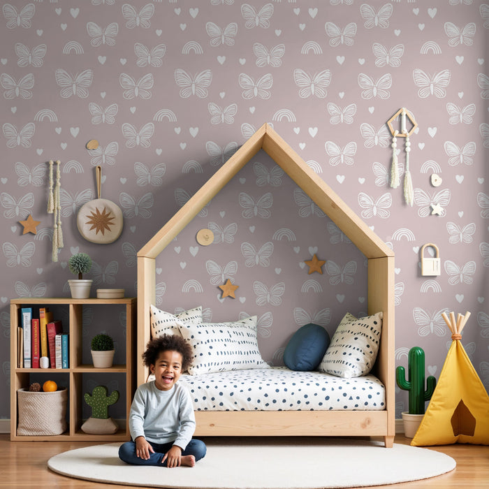 Papier peint chambre enfant à motifs | Papillons délicats et arc-en-ciel sur fond rose