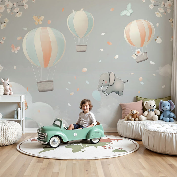 Papier peint chambre bébé | Montgolfières pastel et éléphant rêveur dans les nuages